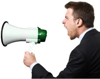 businessman shouting on the megaphone